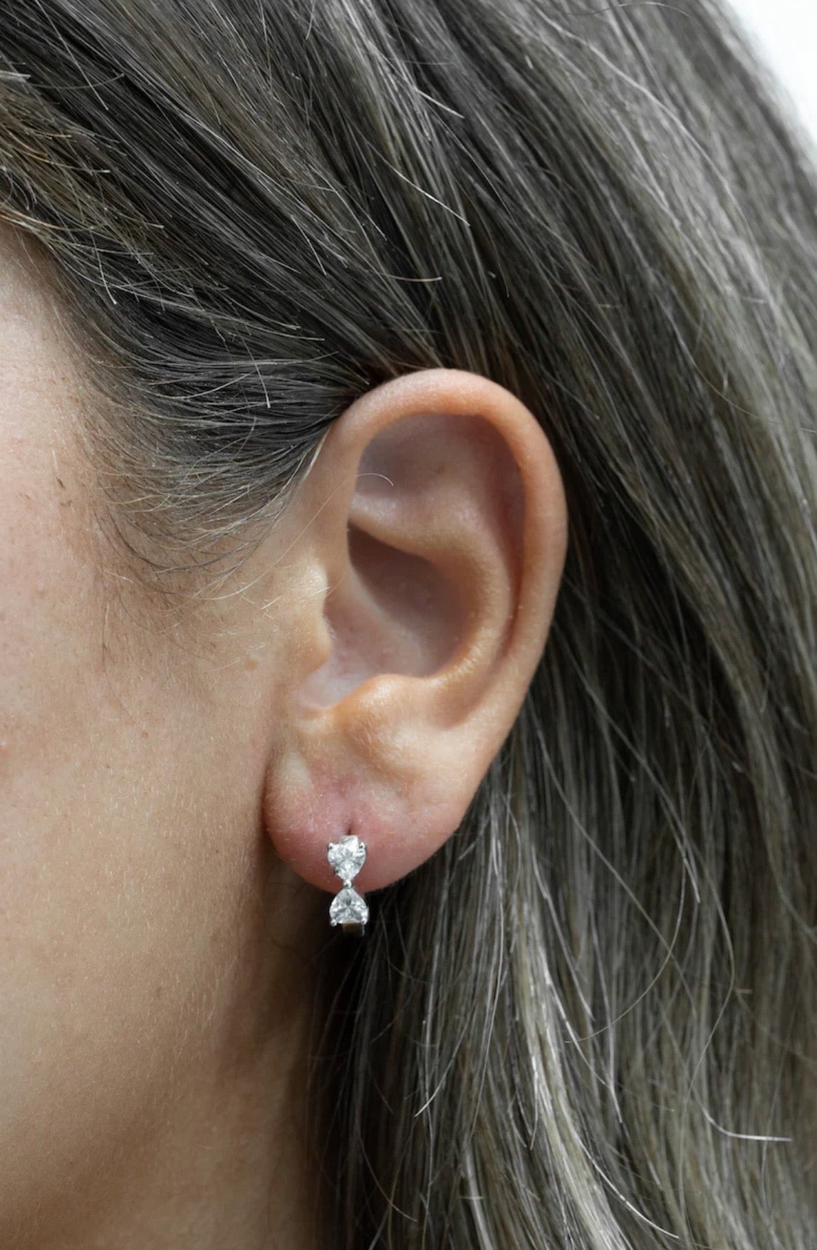 Silver Cubic Bow Huggie Earrings