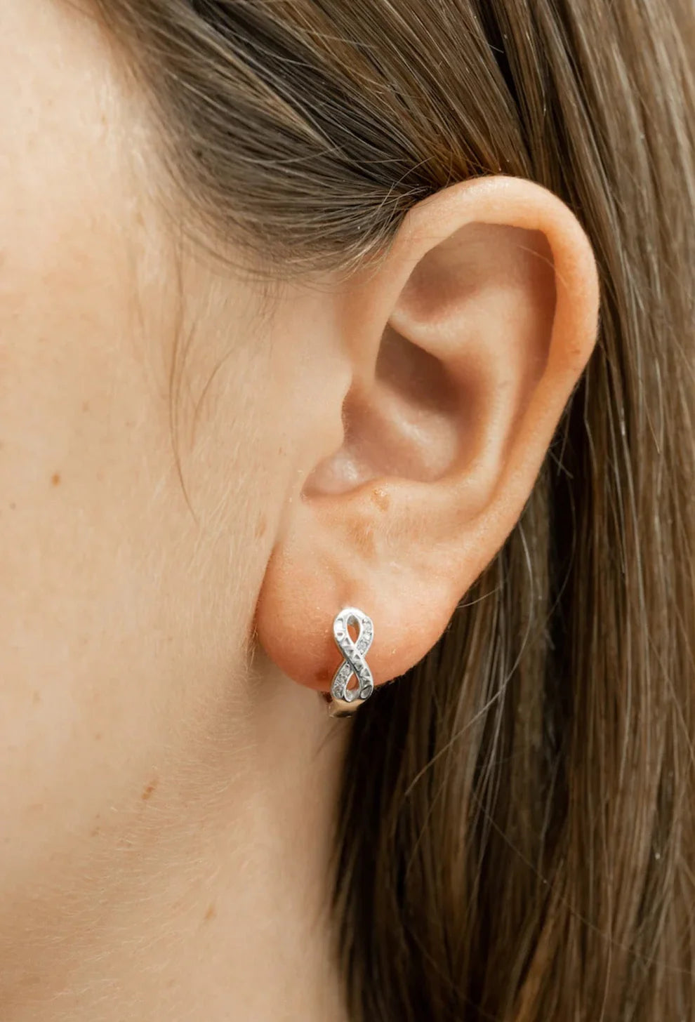 Infinity-Inspired CZ Huggie Earrings