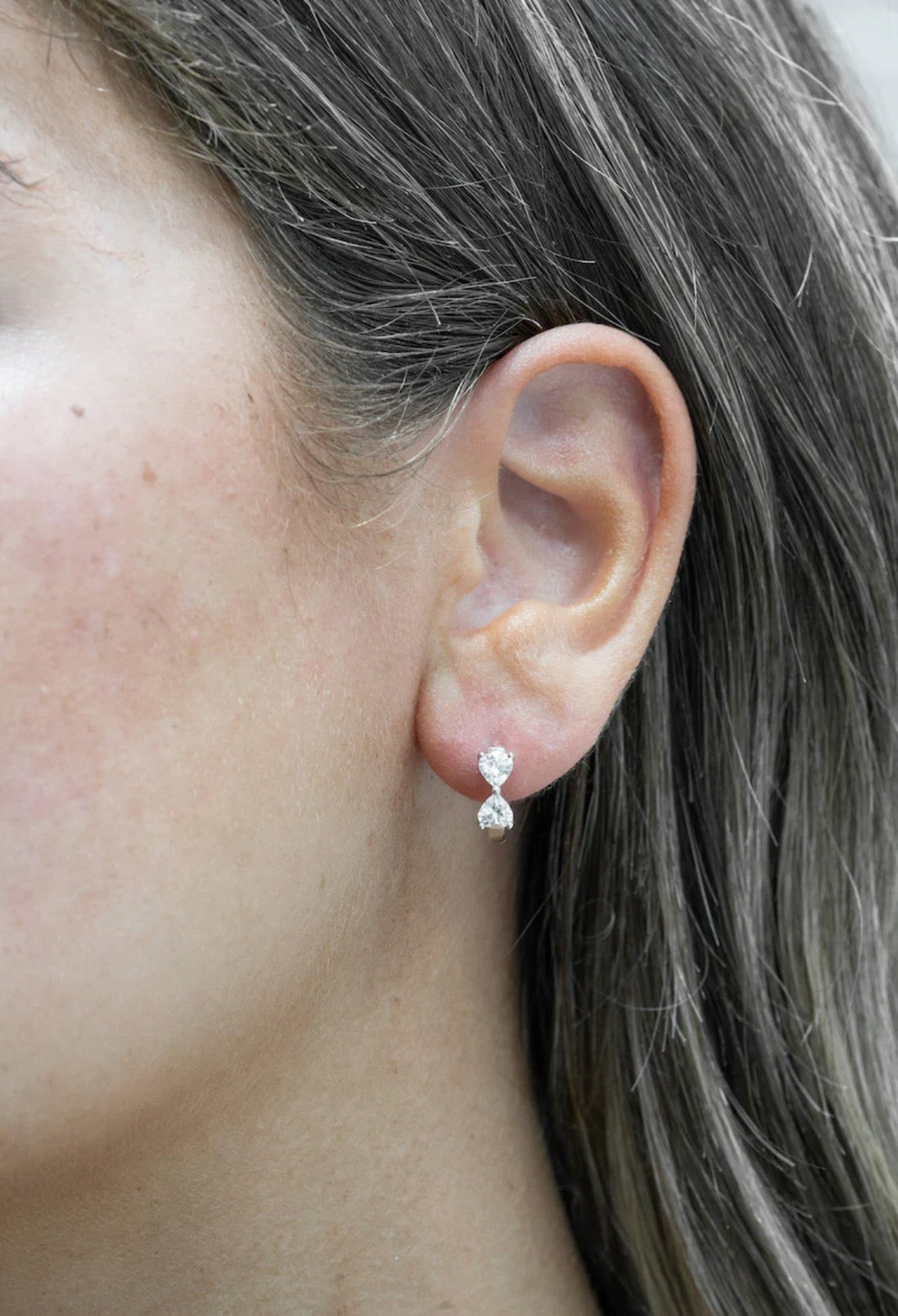 Silver Cubic Bow Huggie Earrings